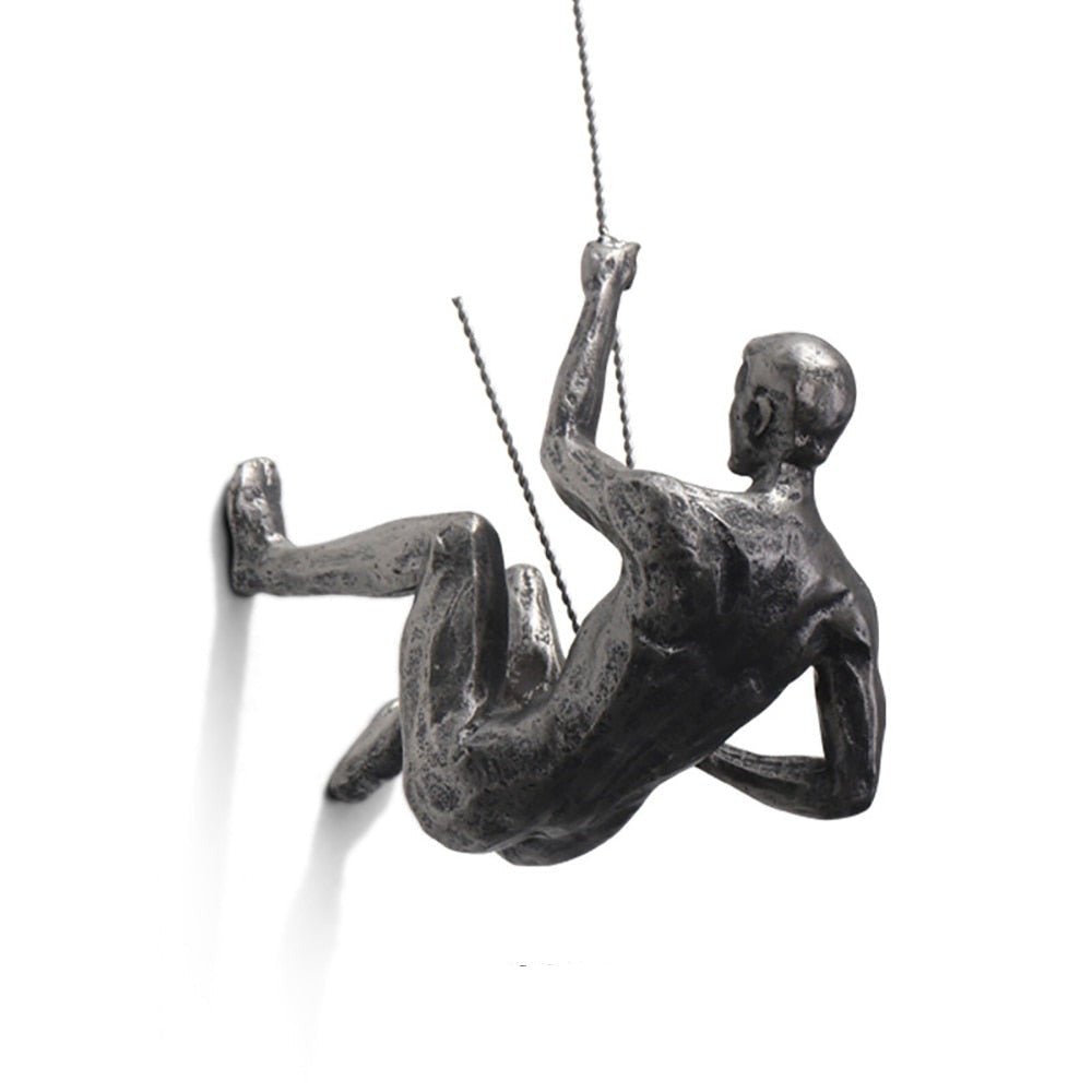 Climbing Figure Resin Wall Sculpture – Hand-Finished Art Figure