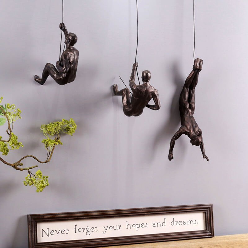 Climbing Figure Resin Wall Sculpture – Hand-Finished Art Figure