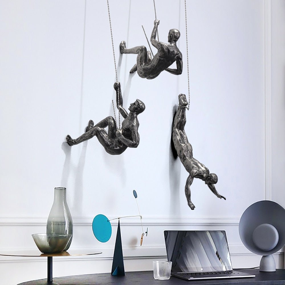 Climbing Figure Resin Wall Sculpture – Hand-Finished Art Figure